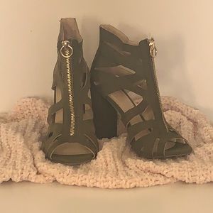 I am selling a pair of size 6, olive green heels (Sandals) from Charlotte Russe.